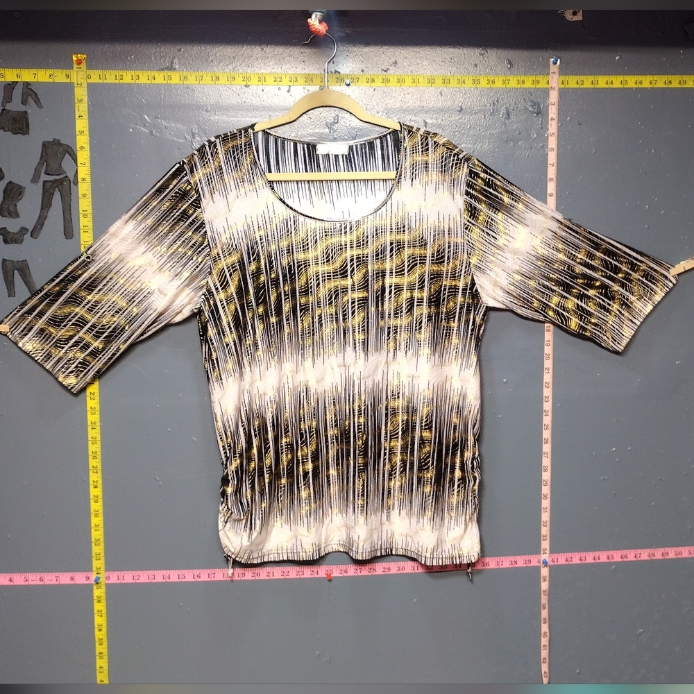Stretchy, black, gold, and cream maternity top